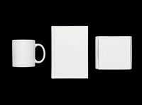 Blank white mug, poster, and canvas mockup set isolated on transparent background. Ready for sublimation, print-on-demand, t-shirt design, and custom merchandise projects.