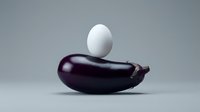 White egg balanced on dark purple eggplant against gray background. Minimalist food composition for healthy eating and cooking concepts.