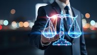 Professional businessman holding glowing digital scales of justice with network connections representing legal technology and law firm innovation.