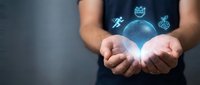 Hands holding glowing digital health icons including running figure, heart rate monitor, and medical symbols representing wellness technology and healthcare innovation.