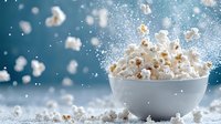 Fresh popcorn exploding from white ceramic bowl against blue background with flying kernels and magical sparkle effect, creating dynamic food composition.