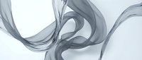 Elegant gray smoke swirls creating fluid abstract patterns on white background for modern design projects and creative compositions.