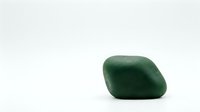 Green aventurine healing crystal stone isolated on white background for meditation, spiritual wellness and energy work applications.