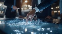 Businessman touching digital interface with glowing network visualization on dark table surface, futuristic technology concept showing data connectivity.