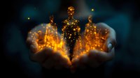 Magical glowing silhouettes of golden light particles emerge from cupped hands against dark background, creating mystical spiritual energy visualization effect.