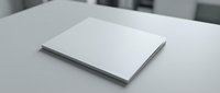 Blank white book or magazine mockup on clean desk surface for branding and design presentation projects.