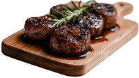 Grilled beef steaks with rosemary on wooden cutting board, perfectly cooked meat with grill marks for restaurant menu and culinary content.