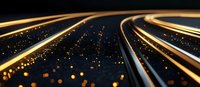 Glowing golden light trails curve into distance against dark background with scattered luminous particles creating dynamic motion effect.