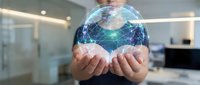 Professional businessman holding holographic digital globe with network connections in modern office environment showcasing global business technology solutions.