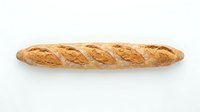Freshly baked French baguette with crispy golden crust and diagonal scoring marks, isolated on white background for bakery, food, and culinary design use.