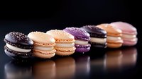 Colorful French macarons in row with chocolate, vanilla, purple and pink flavors on dark reflective surface for bakery menu and dessert photography.
