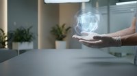 Businessman holding glowing digital sphere hologram in modern office workspace representing innovation technology and futuristic business solutions.