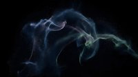 Abstract flowing particles and smoke swirling in blue and green tones against dark background, suitable for motion graphics, visual effects, and digital design projects.