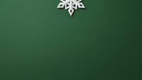 Minimalist white snowflake ornament on dark green background, ideal for winter holiday greeting cards, seasonal marketing materials, and festive design projects.