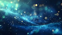 Magical glowing particles flow in deep blue space creating ethereal wave effect with bokeh lights and sparkling dust in dreamy atmosphere.
