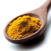 Vibrant yellow turmeric powder heaped in rustic wooden spoon against white background, macro shot highlighting texture and natural color of aromatic spice.