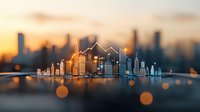 Glowing city skyline with white line art buildings against blurred urban background at sunset, creating modern minimalist composition with bokeh effect.