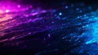 Vibrant abstract background with glowing pink and blue bokeh lights on dark textured surface, creating magical cosmic atmosphere for creative design projects.