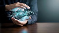 Professional businessman hands protecting glowing digital network sphere with futuristic holographic connections and data visualization technology.