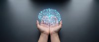 Digital brain network floating above cupped hands representing artificial intelligence, machine learning, and neural connections in futuristic technology concept.