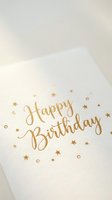 Elegant white birthday card with gold foil calligraphy and scattered stars, perfect for celebration greetings and party stationery design.