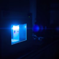 Futuristic holographic display screen with glowing blue interface in dark digital environment for technology presentations and sci-fi concepts.