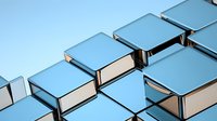Geometric metallic cubes arranged in modern architectural pattern with light blue reflective surfaces and beige sides creating dynamic perspective composition.