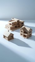 Wooden miniature house models on white surface representing real estate investment, property development and architectural planning concepts.