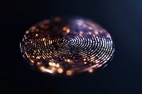 Digital fingerprint scan with glowing orange light effects on dark background, futuristic biometric security technology concept for identity verification.