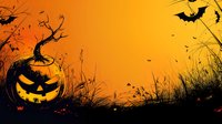 Spooky Halloween scene with glowing jack o lantern pumpkin against orange sunset sky, silhouettes of flying bats and twisted dead tree creating eerie atmosphere.