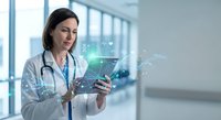 Female doctor using digital tablet with holographic medical data interface in modern hospital corridor for healthcare technology applications.