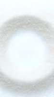Granulated white sugar crystals arranged in circular form on white background, isolated and ready for food, culinary, baking, and ingredient design projects.