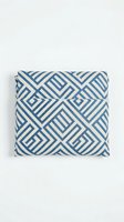 Blue and white geometric striped cushion with diamond and linear patterns for home decor and interior design projects.