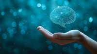 Female hand holding glowing digital brain hologram against turquoise bokeh background, representing artificial intelligence and cognitive technology advancement.