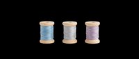 Three pastel thread spools in blue, gray, and lavender on transparent background, ready for sewing clipart, stickers, t-shirt design, and print on demand use.