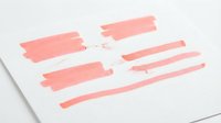 Coral pink highlighter marker strokes on white paper, isolated design element for graphic projects, presentations, and creative layouts.