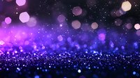 Magical purple and blue glitter background with defocused bokeh lights creating dreamy atmosphere. Sparkling particles fade into dark space.