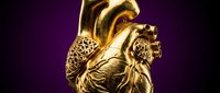 Golden ornate human heart with intricate decorative patterns on purple gradient background for luxury medical and anatomical design projects.