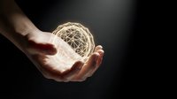 Hand holding glowing wireframe sphere against dark background, representing innovation, technology, and digital connectivity for business and design projects.