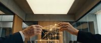 Business partnership concept with hands connecting glowing network lines in modern office environment for teamwork and collaboration projects.