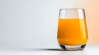 Fresh orange juice in modern stemless glass against gradient background, minimalist composition with copy space for healthy lifestyle and beverage concepts.