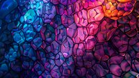 Vibrant abstract mosaic pattern with colorful gradient from deep blue to magenta and orange, featuring organic cellular shapes and dramatic lighting effects.