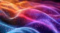 Abstract flowing waves with glowing particles in orange, pink, purple and blue colors creating dynamic motion effect against dark background.