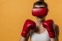Young woman in white tank top wearing red VR headset and boxing gloves against orange background, representing virtual fitness and gaming innovation.