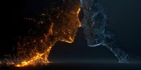 Contrasting digital profiles of human faces formed by glowing orange and blue particles against dark background, representing duality in technology.
