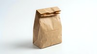 Closed kraft paper bag with folded top on white background, suitable for food packaging, lunch containers, retail bags, and eco-friendly shopping solutions.