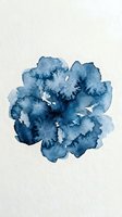 Blue watercolor paint splash with organic flowing texture on white paper background for artistic design projects.
