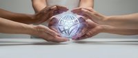 Diverse hands forming protective circle around glowing globe symbol representing global unity, teamwork, environmental protection and worldwide cooperation concept.