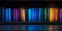 Colorful books arranged in rainbow spectrum order on dark wooden shelf creating magical reflection on surface. Atmospheric library background for education themes.