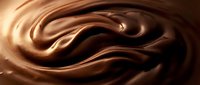 Smooth chocolate liquid swirls in rich brown tones, creating an abstract flowing pattern suitable for food, beverage, and confectionery design projects.